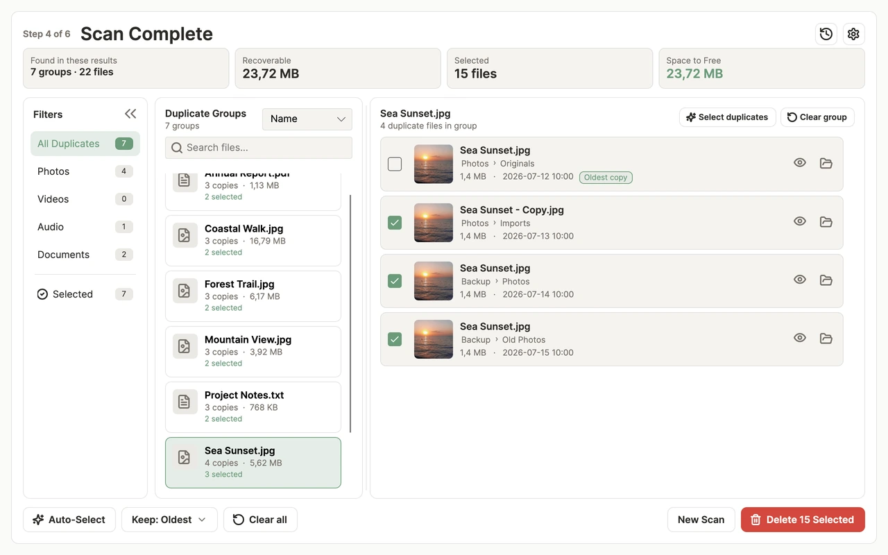 Broom scan results with duplicate groups, file details and selected extra copies.